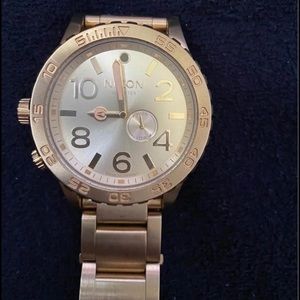 Nixon 51-30 gold watch